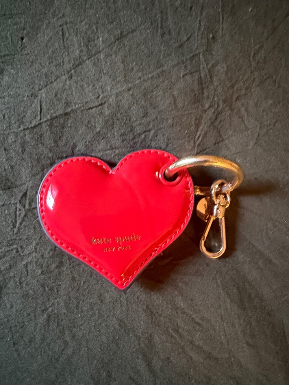 KATE SPADE Red Heart AirTag Cover in EUC